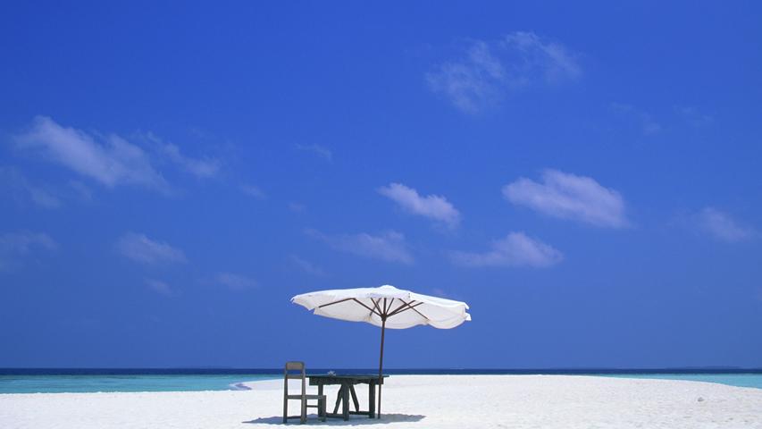 Table and Shade on a Maldives Beach 16:9