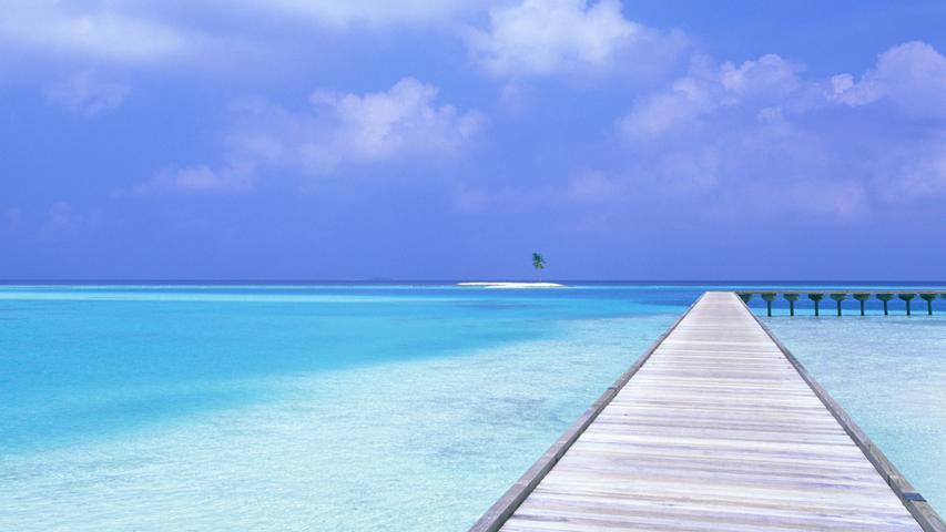 Pier Heading Out From a Maldives Beach 16:9