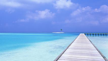 Pier Heading Out From a Maldives Beach 16:9