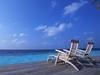 Deck Chairs On The Maldives Beach