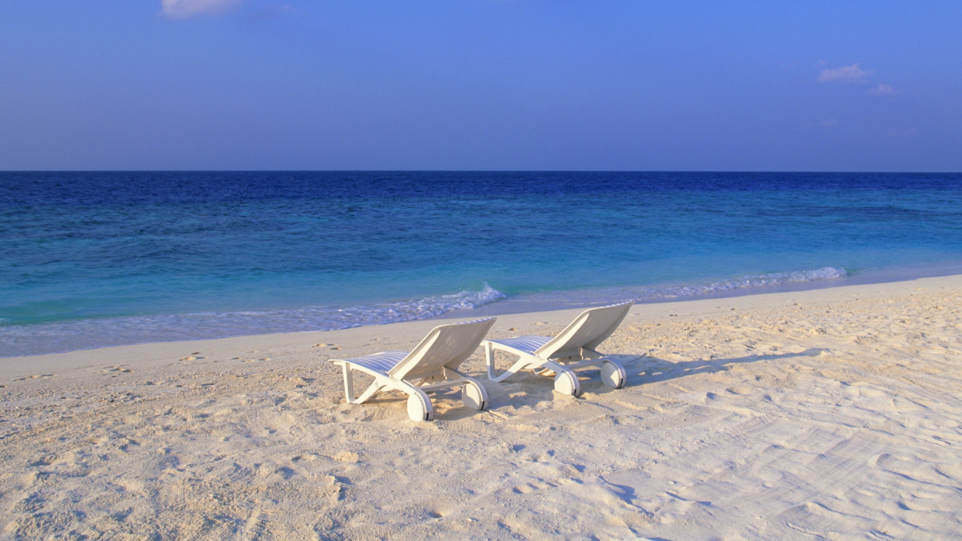 Deck Chairs on the Beach at Maldives